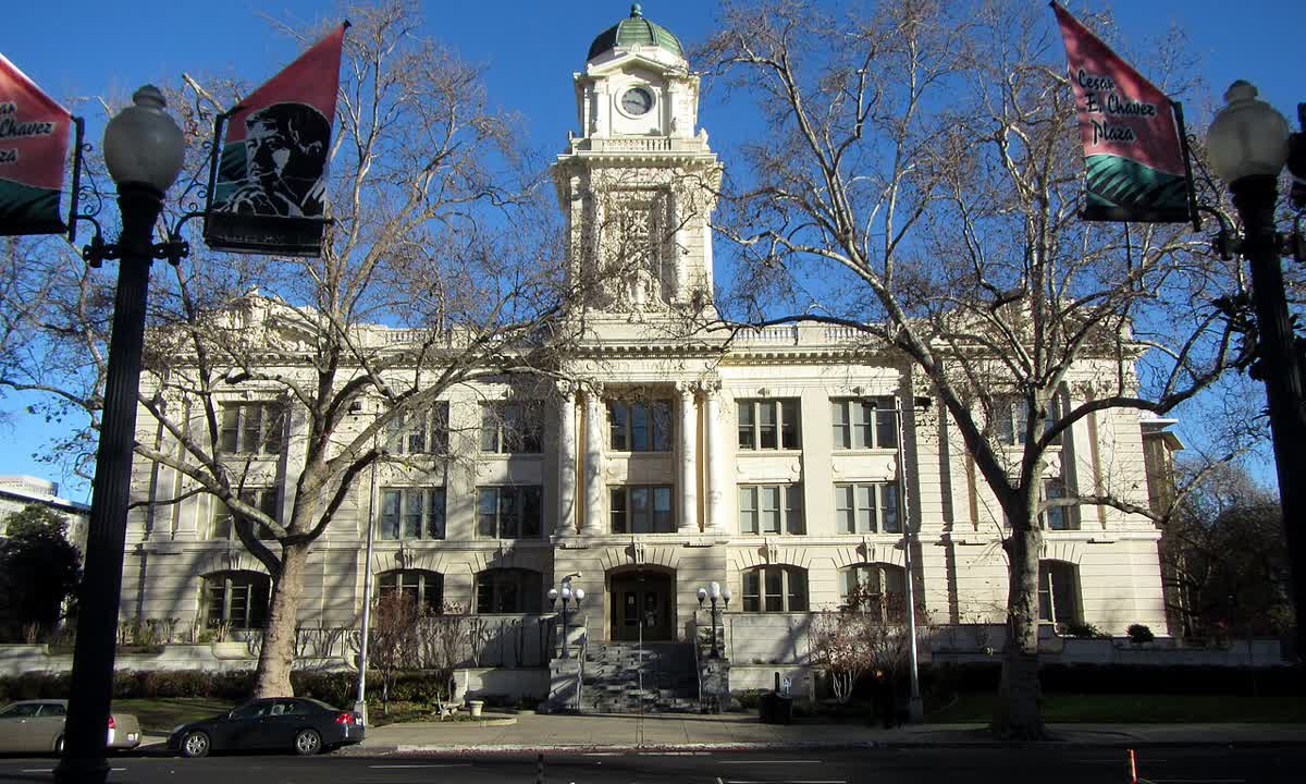Sacramento's historic City Hall with its clock tower, seen from the street